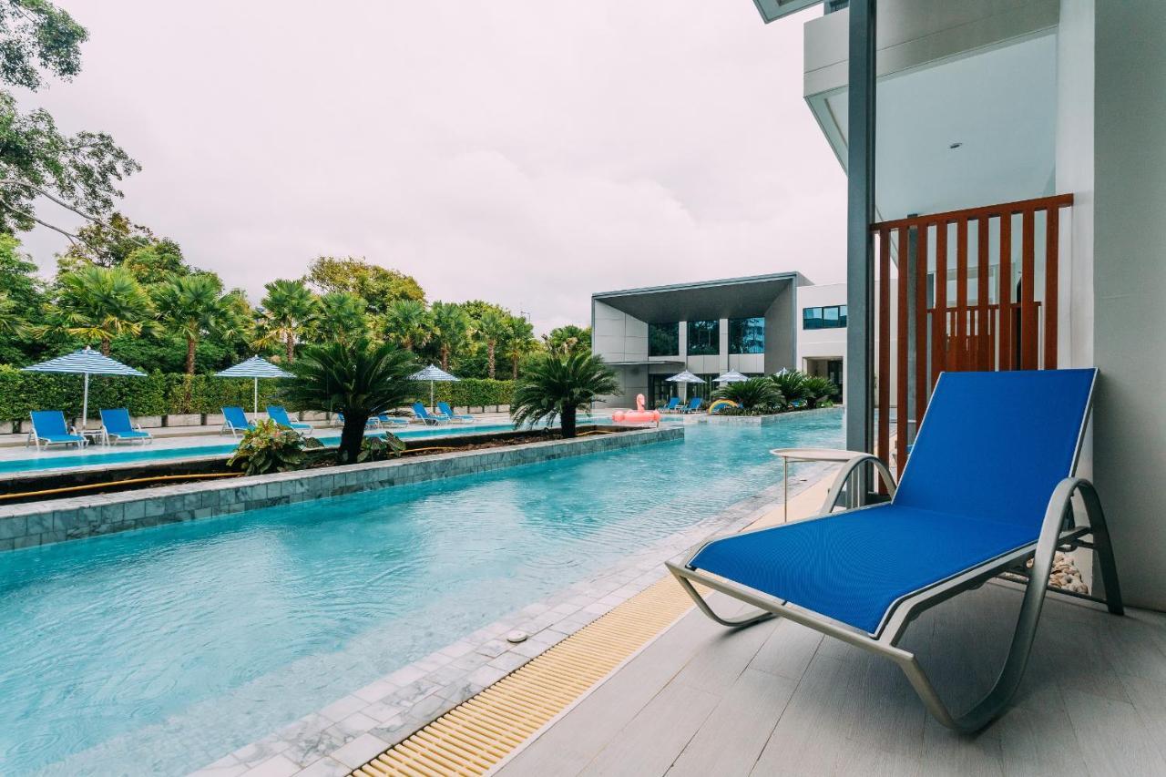 Seabed Grand Hotel Phuket - Sha Extra Plus Exterior photo A poolside chaise longue